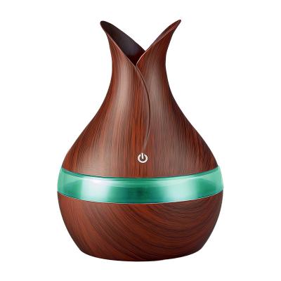 China Car Mini Vase Shaped 7 Colors LED Light Perfume Aromatherapy Air Humidifier Essential Oil Diffuser Humidifier For Home Office for sale