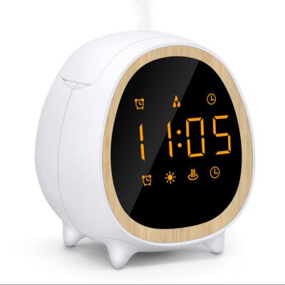 China Smell New 2022 Alarm Clock Aromatherapy Humidifier Clock Atomizer Comfortable Ultrasonic Home Mute Wood Grain Humidifier for sale