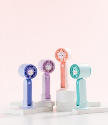 China Portable Mini Small Hotel Fan Motor Wind USB Handheld Ultra Quiet Adorable Fan New In 2022 for sale