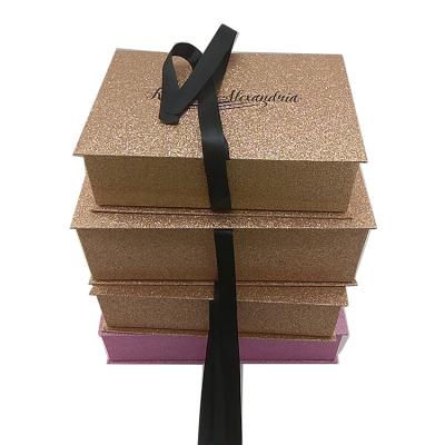 China Custom Recyclable Luxury Glitter Gold Magnetic Packaging Wig Pink Gift Box With Ribbon for sale