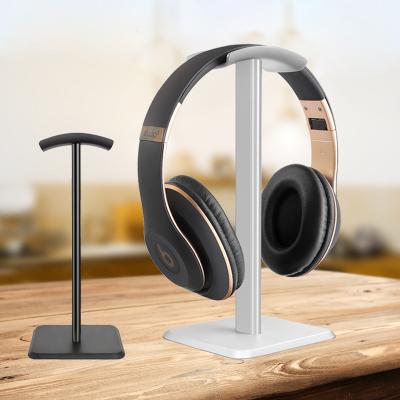 China Detachable Portable Universal Hot Glue Aluminum Soft Earphone Holder/Headset Stand/Earphone Desk Stand for sale