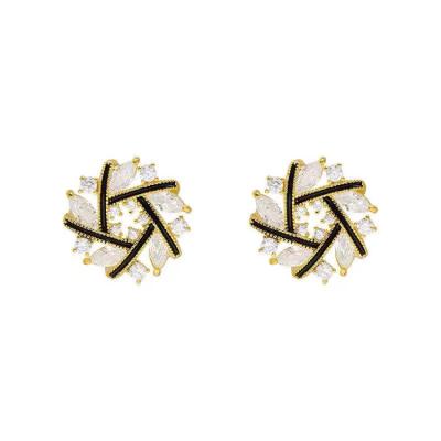 China Fashionable Personality Luxury Design Snowflake Diamond Alloy Stud Earrings Women Creative Jewelry for sale