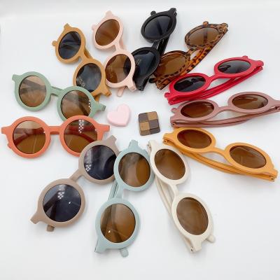 China Fashion Sunglasses 2023 Wholesale Hot Selling Custom Made Kids Sun Glasses Children Sun Glasses Flexible Logo Frame UV400 Fashion Colorful Round for sale