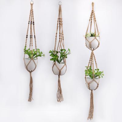 China Tropical Nordic Macrame Wall Hanging Plant Hangers Wooden Flower Pot Holder Stand Set Hogar Outdoor Hanging Home Decor Accessories for sale