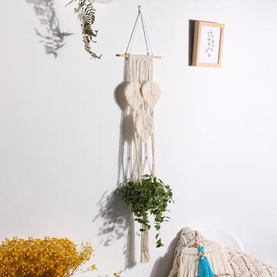 China Tropical Handmade Boho Flowerpot Plant Holder Macrame Plant Hangers Cotton Beige Wooden Rope Hanging Indoor Garden Hogar Decor for sale