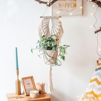 China Plant Tropical Modern Macrame Woven Hanger Rack Wedding Indoor Decor Angel Rope Storage Basket Knot Wall Hanging for sale