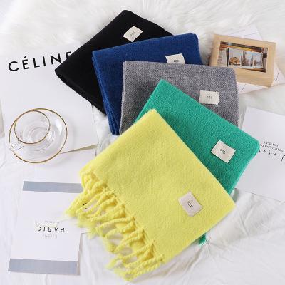 China 2022 Yiwu Acrylic Hot Selling Children's Lovely Kids Girls Boys Girls Wool Winter Autumn Scarf Solid Color Tassel Bib Warm Hijab for sale