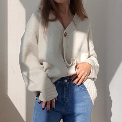 China Anti-wrinkle White V-Neck Buttons Long Sleeve Autumn Winter Cardigan Knitwear Korean Style Casual Sweater for sale