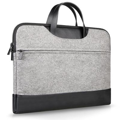 China Latest Slim Design Decorative Laptop Sleeve Bag Felt Notebook Bag Handle Laptop Bag For Macbook for sale