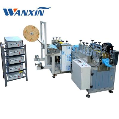 China WXT-350 factory DISPOSABLE NONWOVEN SHOE COVER PRODUCTION EQUIPMENT for sale