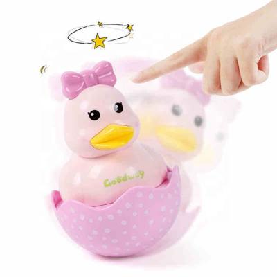 China Plastic Tumbler Mouth Teether Silicone Tumbler Toy Pale Pinks Yellow Bath Duck With Sound for sale