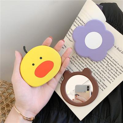 China Ins cartoon cute silica gel small mirror lady to carry with hand piglet makeup mirror portable custom for sale