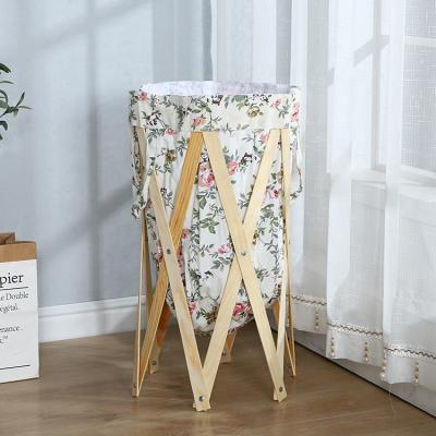 China Sustainable Cotton Canvas Clothes Folding Wooden Frame Laundry Hamper With Handle for sale