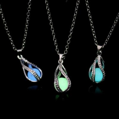 China TRENDY Luminous Night Glow in the Dark Box Open Pendant Hollow Out Moonstone Necklace for sale