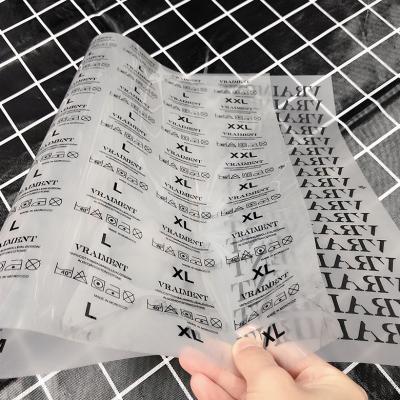 China Sustainable Free Sample Tagless Care Label Heat Wash Press Transfers Iron On T Shirt Labels for sale