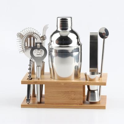 China 8 Pieces Recyclable Wholesale Cheap Stainless Steel Cocktail Shaker With Wooden Stand Shaker for sale