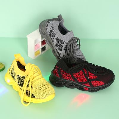 China Low Price Lightweight Wholesale Designers Kids Casual Rising Running Sports Lighted Shoes for sale