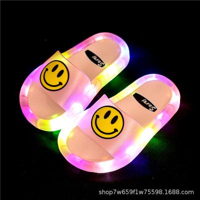 China PVC Lightweight Luminous Kids Smile Face Slipper Anti Slip Toddler Girls Toddler Girls Lighting Led Child Light Slippers for sale