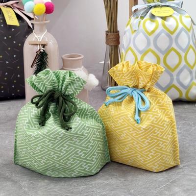 China Custom Gift Japan Style Drawstring Pouches Logo Non Woven Fabric Packing Pouch Promotion Eco Drawstring Bag for sale