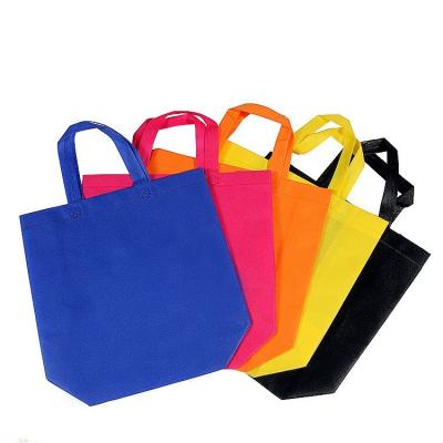 China Customized Handled Logo Printed Packaging Pouches Eco Handle Nonwoven Bags For Clothing Biodegradable Shopping Bags for sale