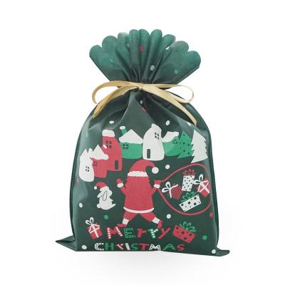 China Non Woven Wrapping Gift Recycle Eco Friendly Christmas Party Decoration Material Bags Drawstring Packaging for sale