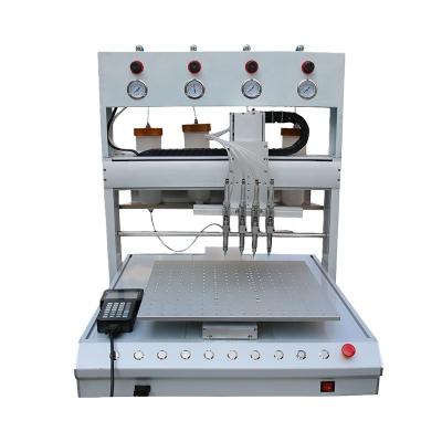 China Automatic Hotels 4 Colors Drip Machine For The Production Of Pendant Key Chain Etc. pvc/silicone label doll for sale