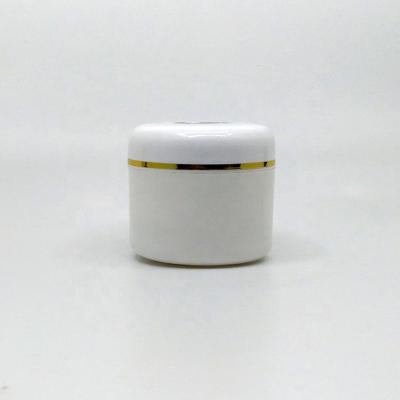 China Hot Sale Cosmetic 60g PP White Cosmetic Jars Plastic Sun Cream Bottles With Gold Line Screw Cap For Skin Care Cream Use for sale