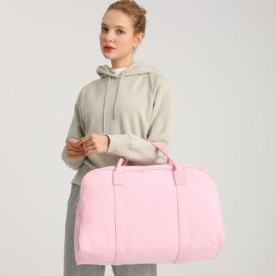 China Wholesale Custom Logo Fashion Weekend Travel Overnight Luggage Bag Women's Duffel Bags Pink Canvas Travel Bag for sale