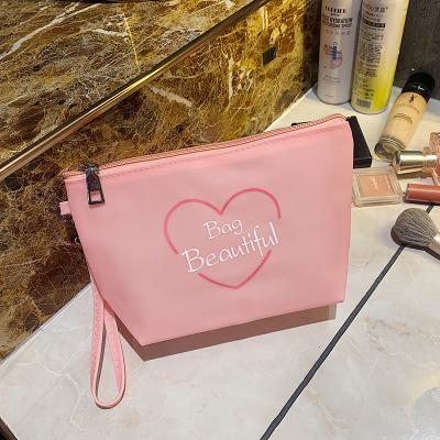 China Wholesale Portable Fashion Packaging Logo Cotton Small Cosmetic Bag Zipper Make Up Bag for sale