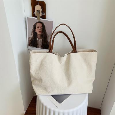 China Portable Fashion Designer High Quality Luxury Women's Tote Bag Custom Logo Cotton Canvas Large Capacity Shopping Bag Handbag for sale