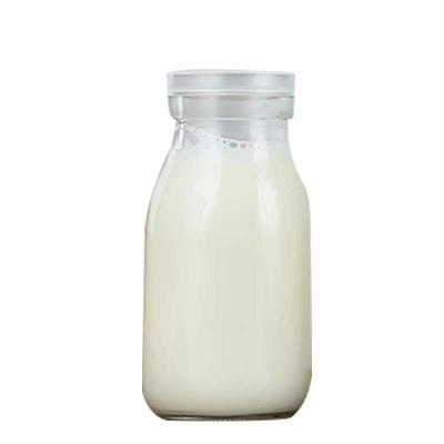 China 500Ml Milk Juice Glass Bottle With Plastic Order-Friendly Clear Lid for sale