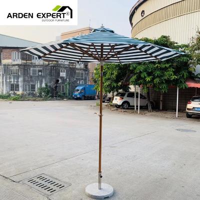 China Sun Wind Rain Make Resistant Nordic Style Nature Umbrella Sun Shade With Wheels Parasol Beach Umbrella Coastal Beach Umbrella With Pizza Shape Base for sale