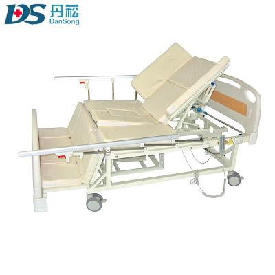 China Comfortable electric motor hospital bed with chest of drawers for sale