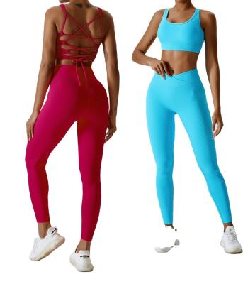 China Breathable 2023 New Ribbed Yoga Set Women Sexy Sports Bra Sports Cross Waist Leggings Gym Wear Custom Logo Yoga Workout Sets For Women for sale