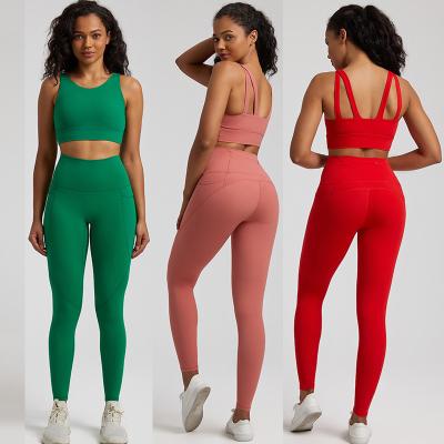 China Breathable New Woman Sports Butt Lift Leggings Yoga Pants Shoulder Straps Crossed Sports Bra 2 Piece Yoga Sets Sportswear Fitness For Women for sale