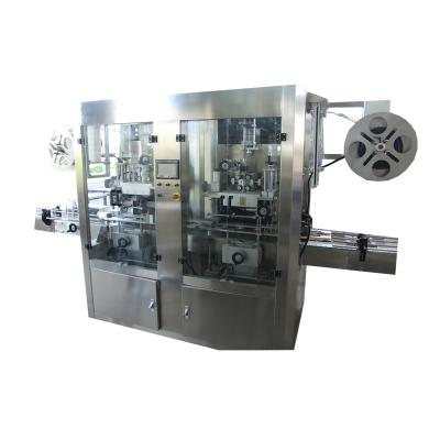 China Beverage PET plastic bottle double heads shrink sleeve bottle labeling machine with steam generator shrink tunnel liquid packing machine for sale