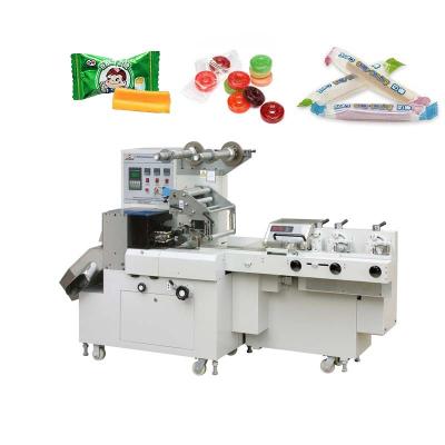 China Computer Controlled Horizontal Milky Caramel Candy Wrapping Machine JY-1200/DXD-1200 for sale