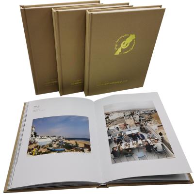 China Eco-Friend Gold Foil Photography Hardcover Book Photo Album Book Custom Editing Moving Printing for sale