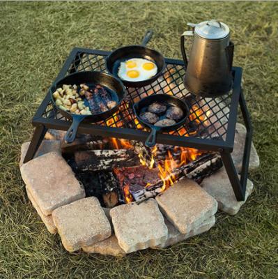 China Heavy Duty Adjustable Height Over Fire Camp Grill Folding Portable Camping Cooking Grill With Legs for sale