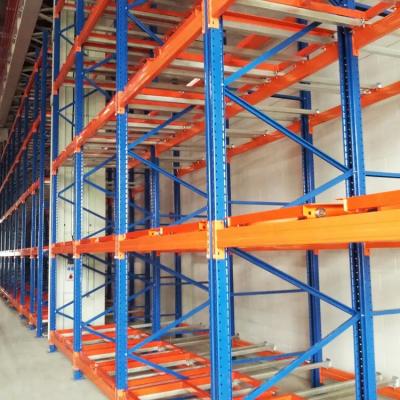 China Warehouse Storage Steel Push Back Racking System Inclined Rail Safety Design for sale