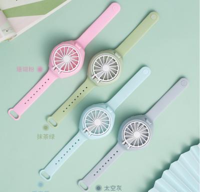 China Outdoor Watch Shaped Mini Fan For Kids In Cool Summer for sale