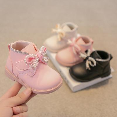 China OEM Flat Nian Boots Pour Women 2021 Cute Hook Buckle Safety Anti-Slip Heel Bowknot Kids Shoes for sale