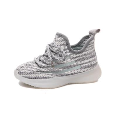 China 2021 New Design Lightweight Fly Weaving OEM Nian Mesh Children Kids Tennis Sneakers for sale