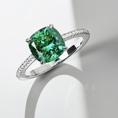 China Wholesale Luxury Crystal Ring Green Gemstone Sterling Silver Wedding Engagement Ring With Elegant Diamond Charm for sale