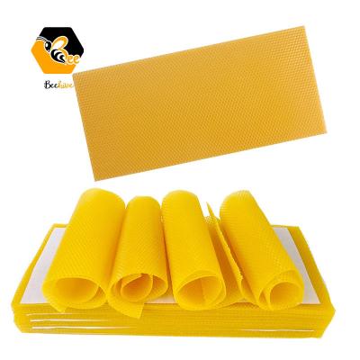 China Bee Farm Beekeeping Tools 5.4 Mm Size Bees Cells / Beeswax Honeycomb Loose Wax Foundation Yellow Sheets for sale