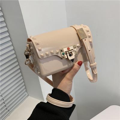 China 2021 Fashion Rivet Lady Mini Crossbody Bag Jelly Shoulder Purse Handbag Women PVC Small Handbags for sale