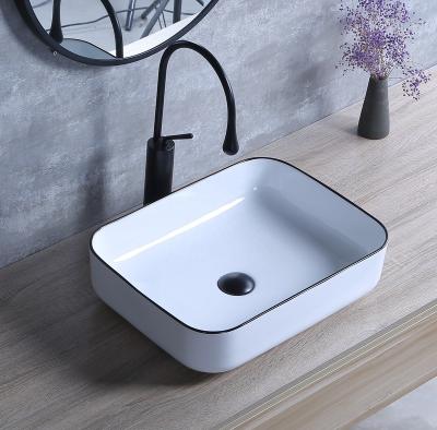 China Easy Clean Porcelain Over Counter Bathroom Vessel Vanity Sink Black Line Art Basin for sale