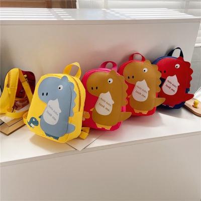 China Wholesale Cute Cartoon Dinosaur Mini Backpack Boys Girls Back School Bag Kids Animal Nylon Package Schoolbag Small for sale