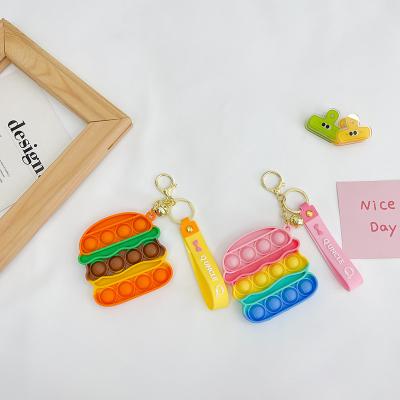 China New Rainbow Mini Unicorn Keychain Children Cartoon Gift Girls Sensory Sound Stress Reliever Squishy Toys Silicone Sound Push Key Ring for sale