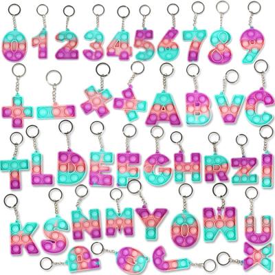 China Fasion New Silicone Letter Key Chain Jumping Its Mini Fidget Toy Bubble Number Alphabet Shape Character Pocket Push Buttons Keychain Set for sale